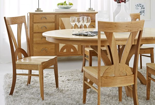 Andromeda single pedestal round extension dining table set